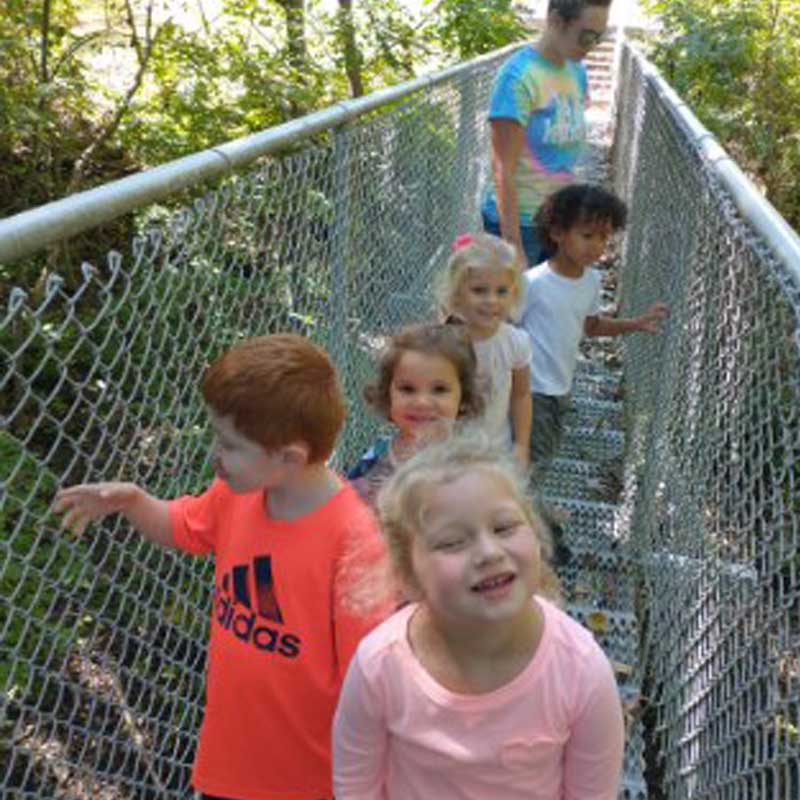kids-outside-on--metal-stairs